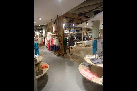 A concrete and wood theme runs throughout